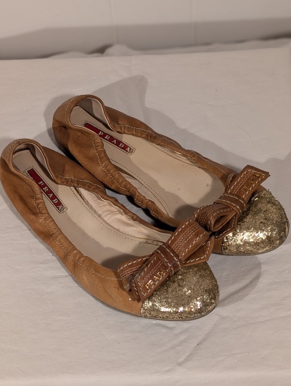 Prada Women’s Brown Leather Ballet Flats with Gold Glitter Toe